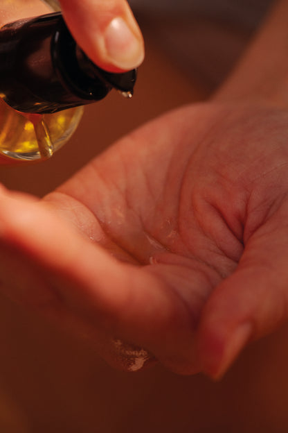 Perineal massage oil